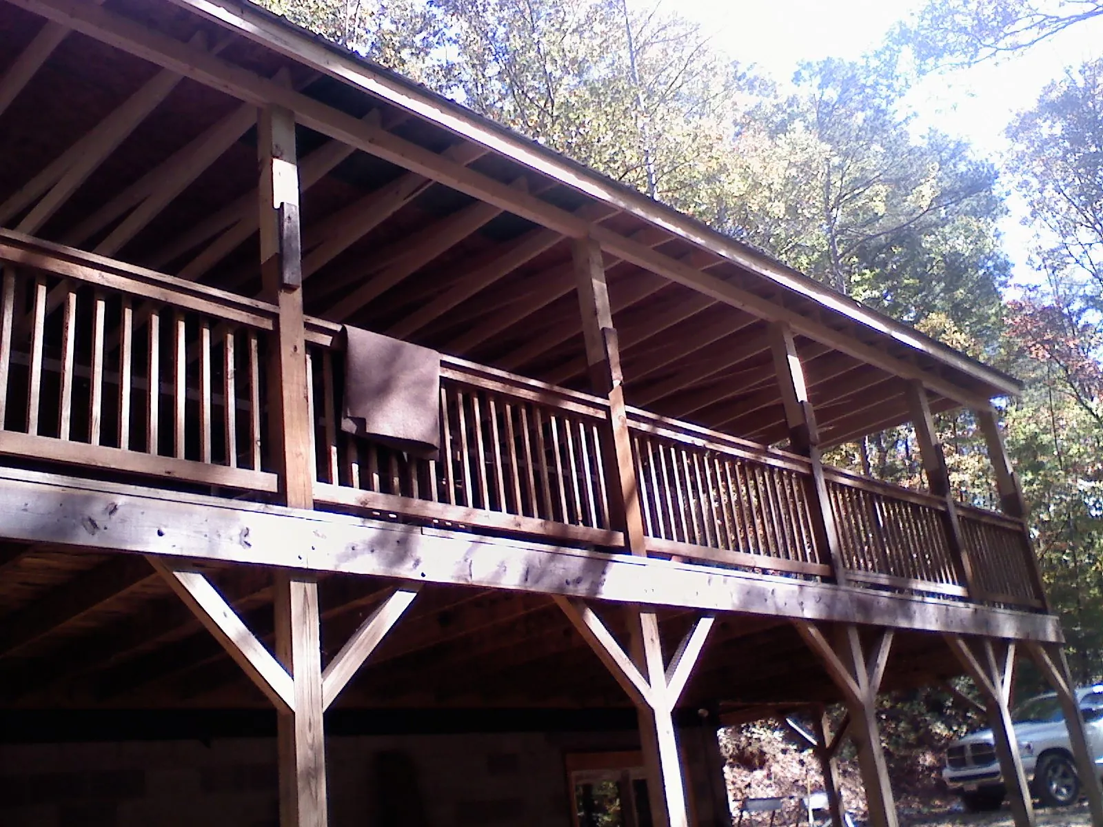 Timber framing under a new elevated porch and deck — Roof Leak Repair in Elmer by Roofing Brothers